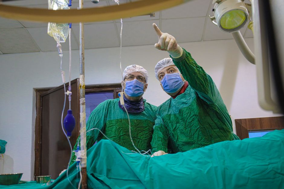 Cardiac electrophysiology team performing an ablation procedure in a catheterisation lab