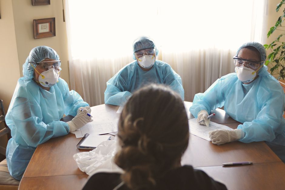 Team of doctors and nurses discussing atrial fibrillation patient care after completing the diploma