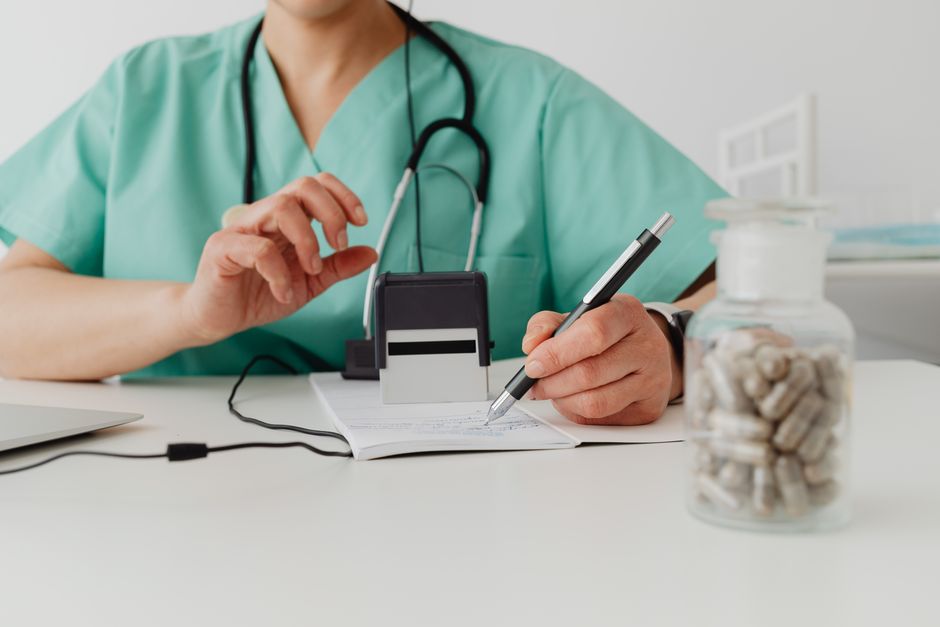Clinician reviewing anticoagulation and NOAC prescription options for atrial fibrillation stroke prevention